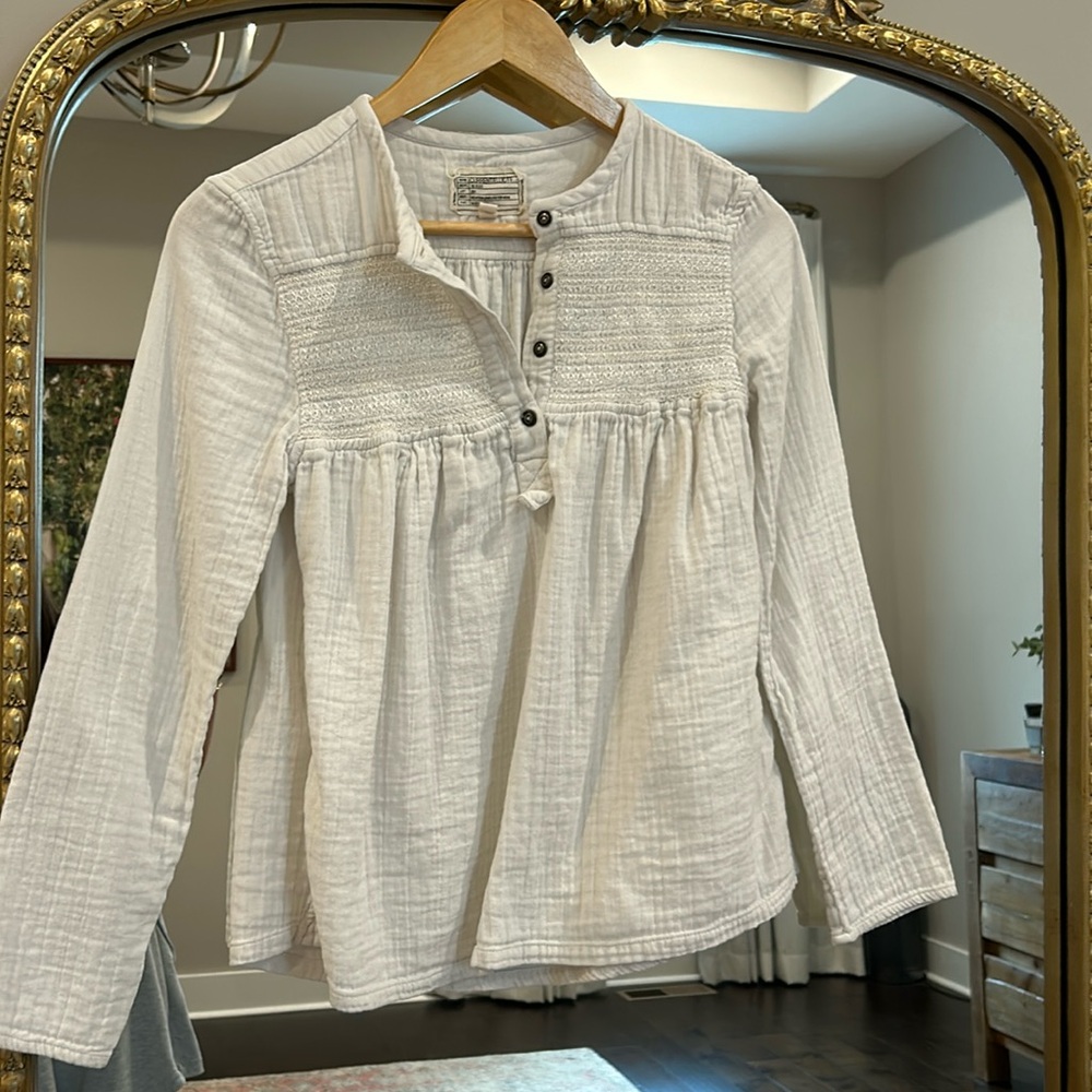 White flowy top
